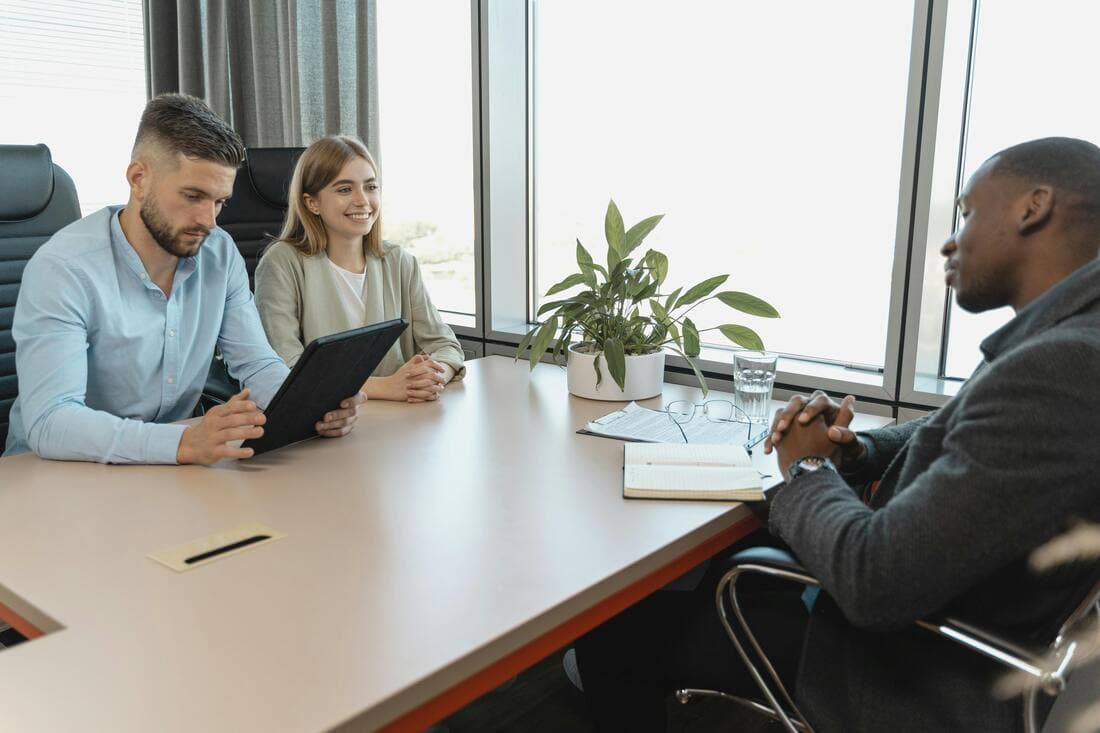 Team reviewing hiring and staffing plans